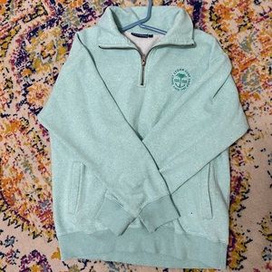Quiet Storm Surf Shop quarter zip.